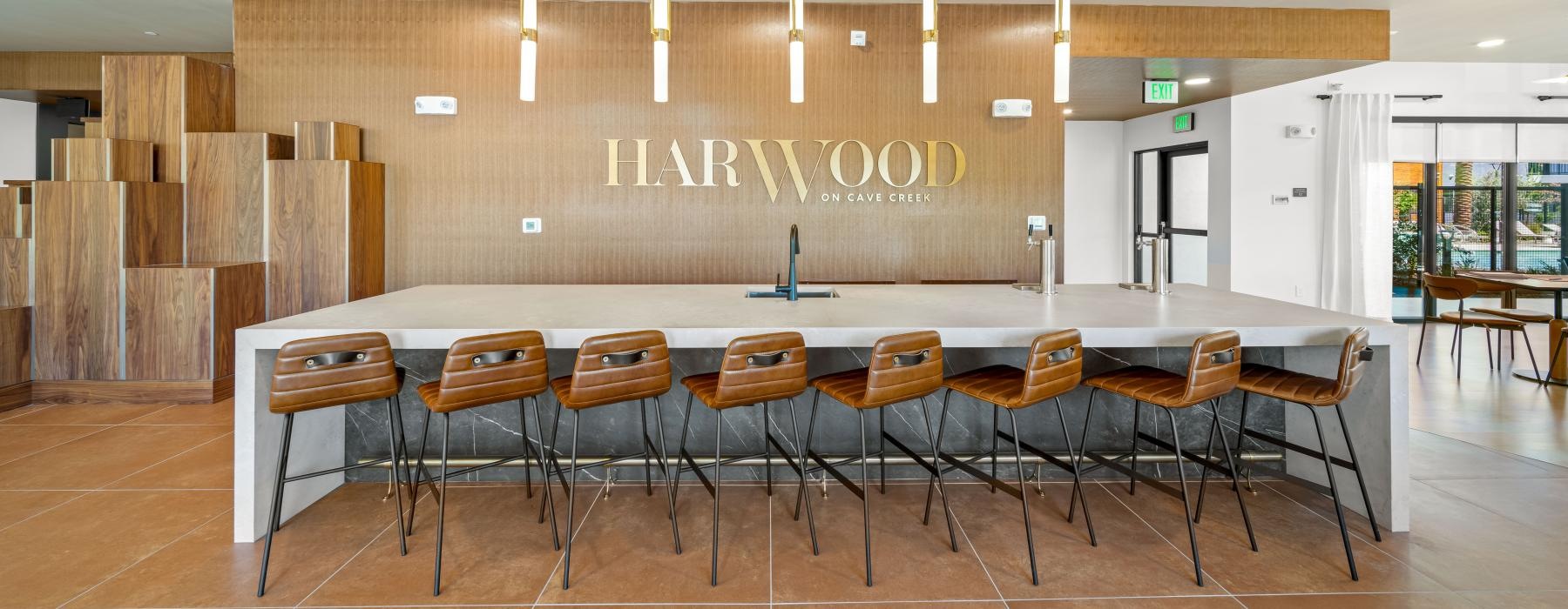 a bar table and chairs