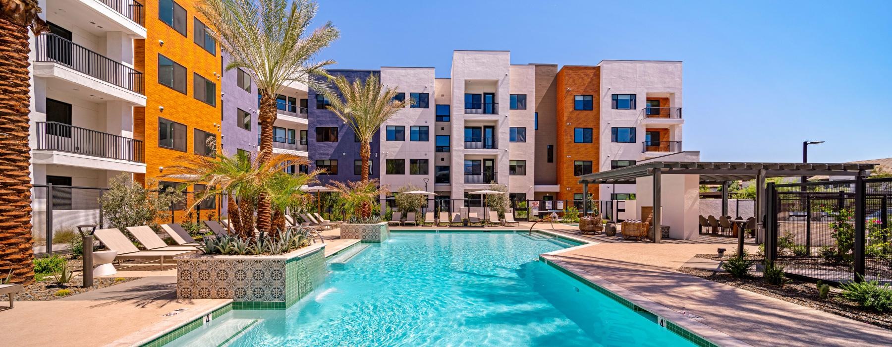 a pool with a building in the background