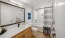 a bathroom with a shower and toilet